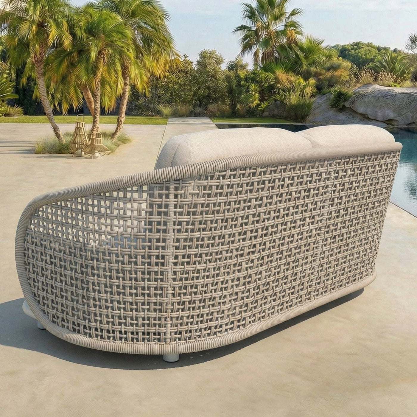 Canapé de jardin 2 places Riviera Meublot avec coussins blancs, vue de dos, design moderne et confortable pour extérieur.