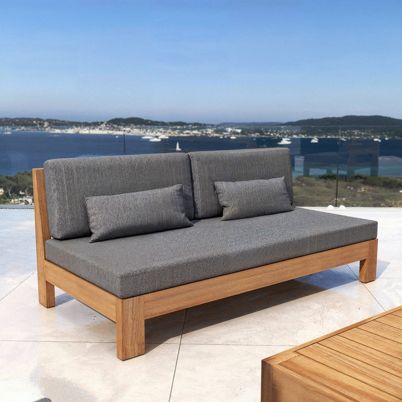 Salon de jardin d'angle Bornéo Meublot avec 7 places, canapé en résine tressée et coussins confortables.