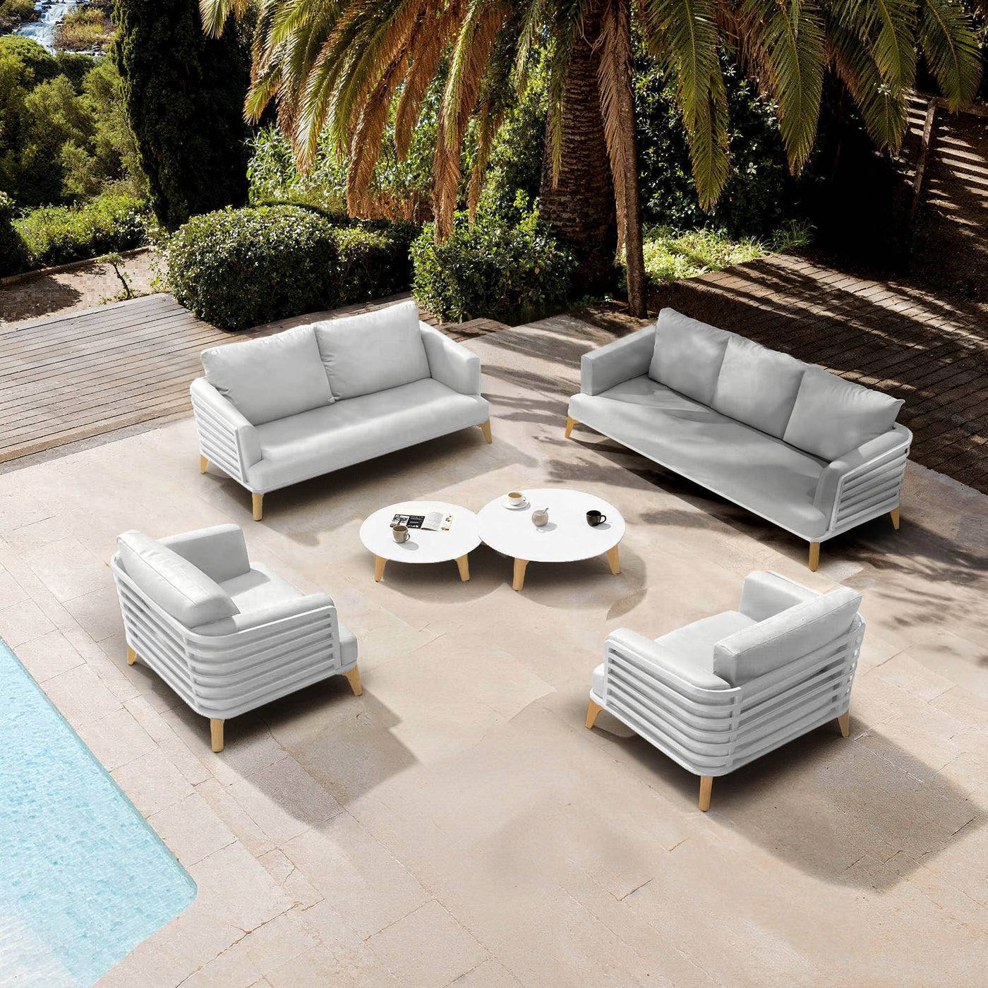 Salon de jardin Monte Carlo 7 places de Meublot avec table blanche et chaises gris nuage, idéal pour extérieur.