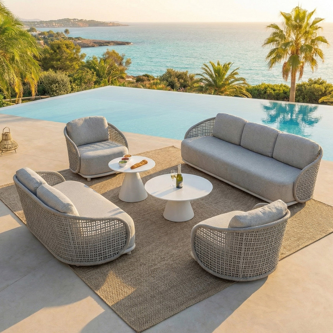 Salon de jardin Riviera 7 places Meublot avec table et fauteuils en bois blanc, idéal pour extérieur élégant et spacieux.