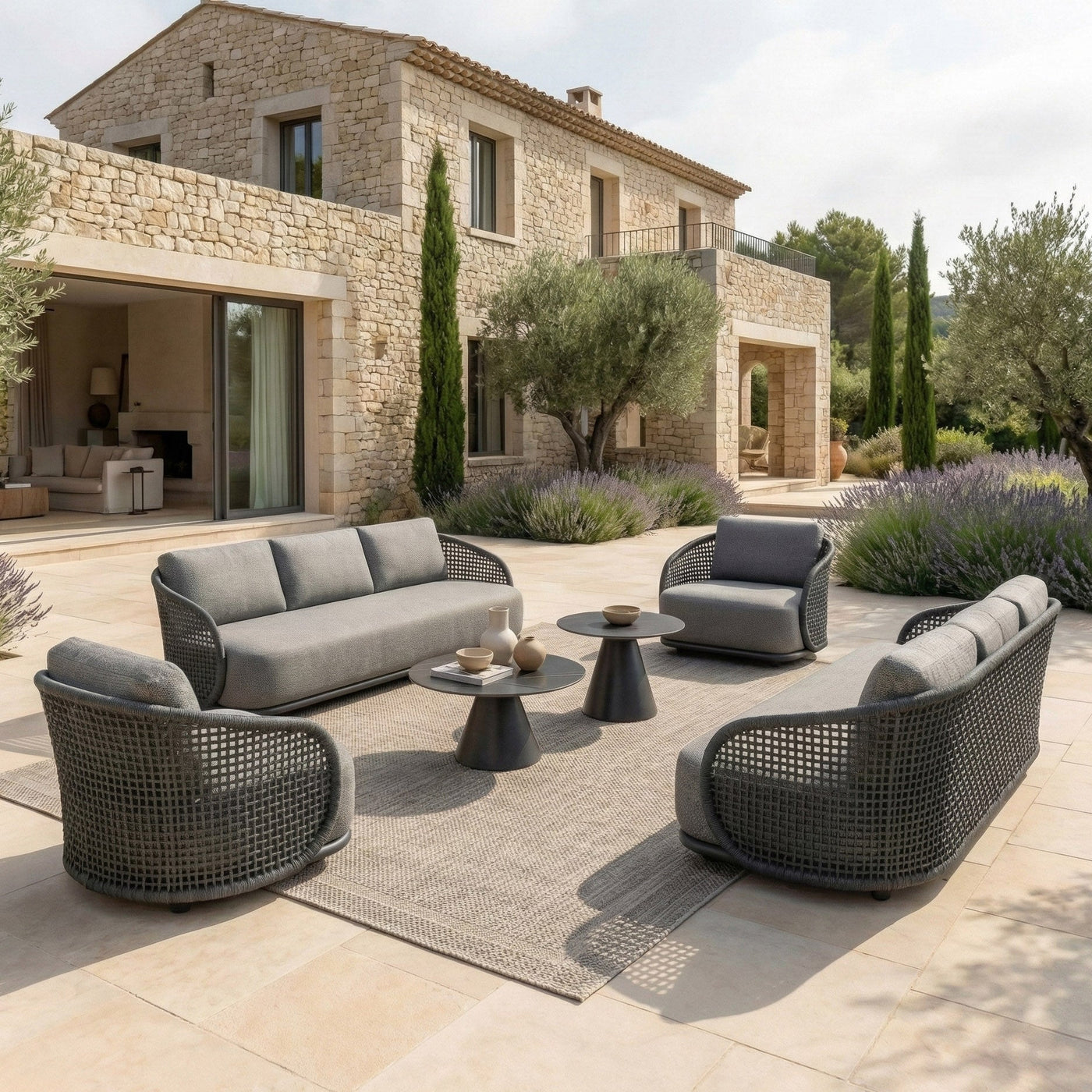 Salon de jardin Riviera 8 places de la marque Meublot avec table anthracite et chaises confortables, idéal pour l'extérieur.