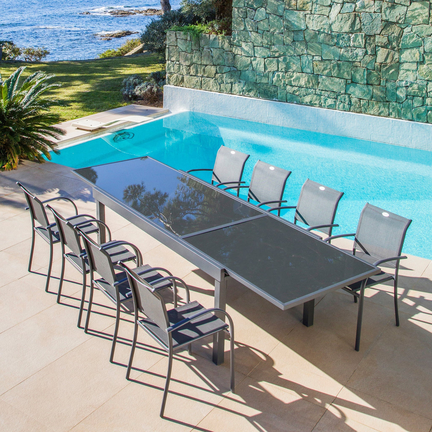 Table de jardin extensible Meublot en verre Murano gris anthracite, table de 10 places, 270 x 90 cm.