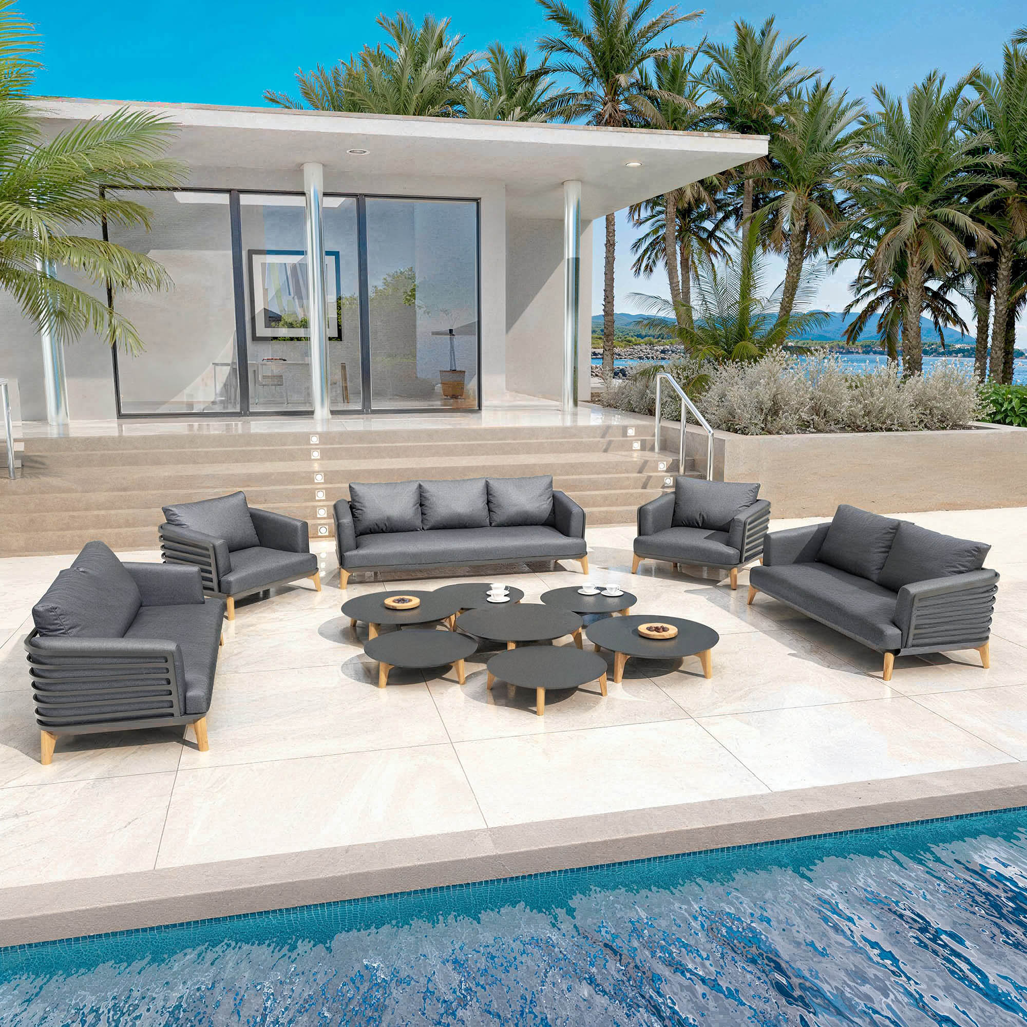 Salon de jardin Monte Carlo 9 places de Meublot avec table et chaises en anthracite, design élégant pour extérieur.